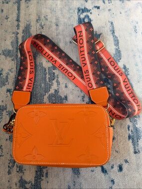 Fashion bag  Orange Monogram Embossed Messenger Bag with Branded Strap